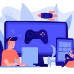 Zwei junge Männer sitzen an mobilen Endgeräten und spielen Computerspiele.