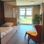 Einblick in den Schlafbereich eines Gesundheitsapartments im Smarten Quartier Jena-Lobeda