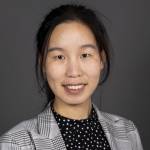Yuxuan Xie lächelt in die Kamera