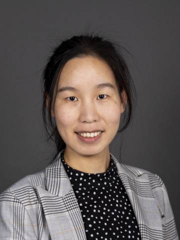 Yuxuan Xie lächelt in die Kamera