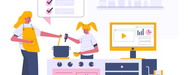 Zwei Personen in der Küche, beide kochen mithilfe eines Online-Rezeptes